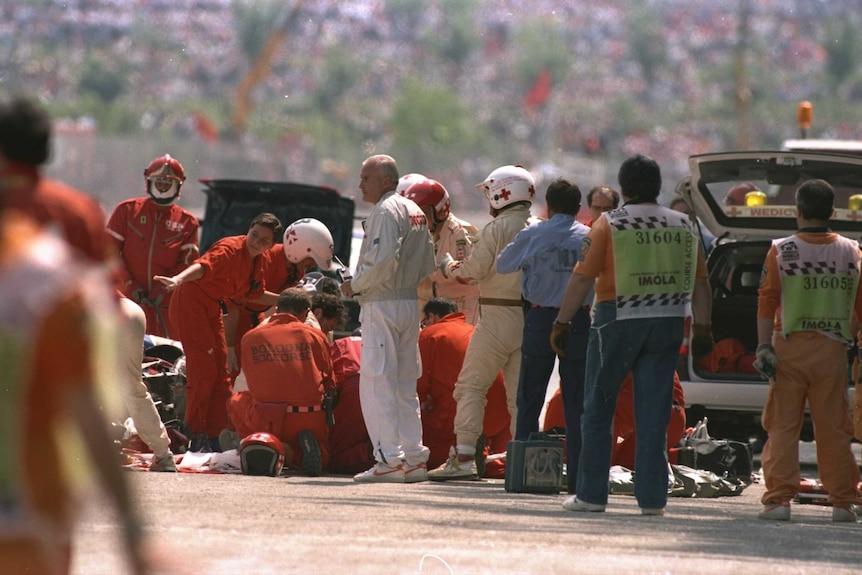 Medical crews attend Ayrton Senna after his fatal crash