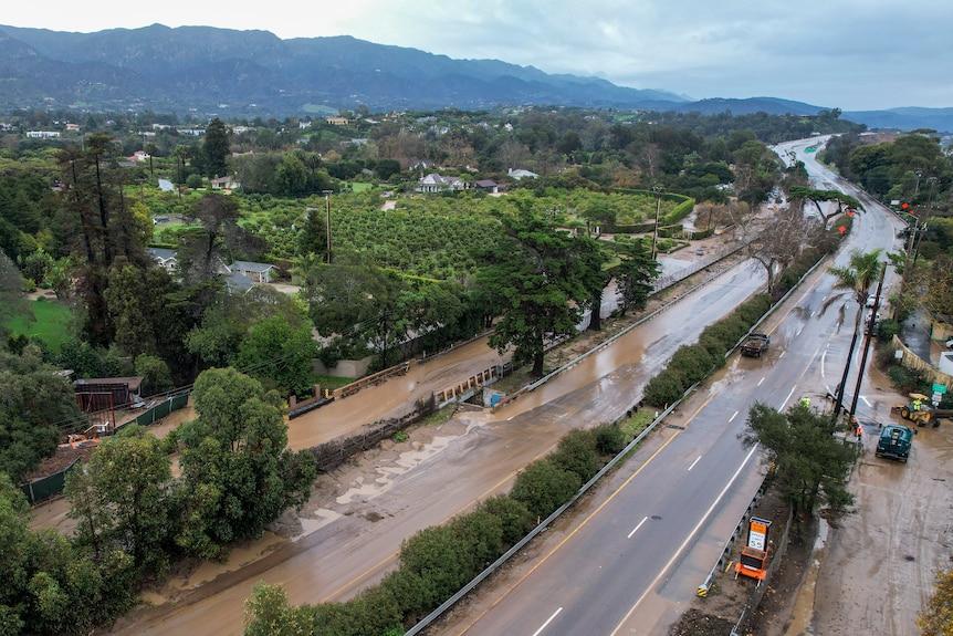 Aerial view of a road covered in flood water