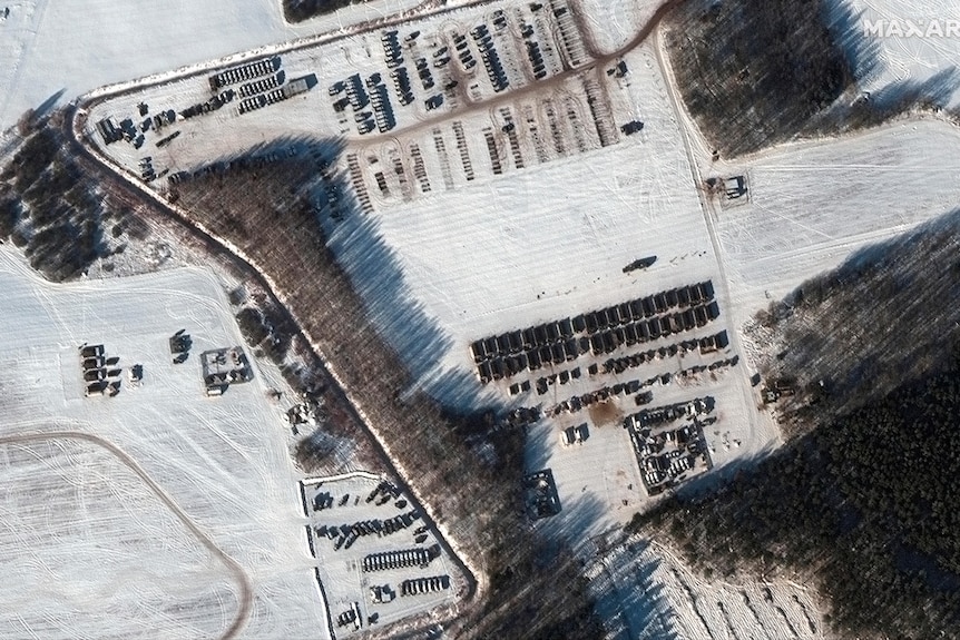  A satellite image shows a troop housing area and vehicle park.