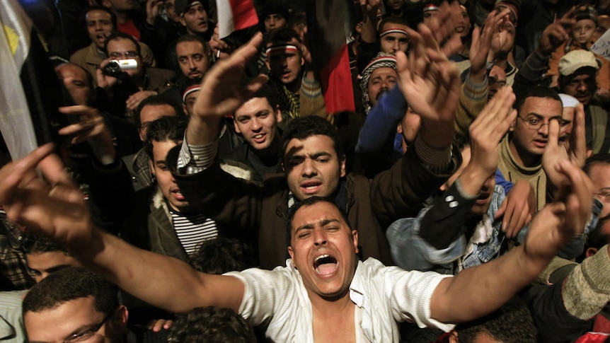 Egyptian protesters shout in response to Hosni Mubarak's decision not to step down. (Reuters: Goran Tomasevic )