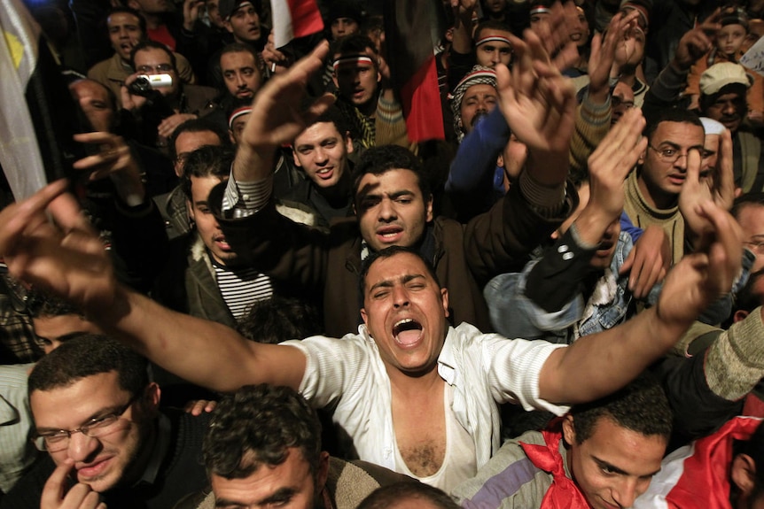 Egyptian protesters shout in response to Hosni Mubarak's decision not to step down. (Reuters: Goran Tomasevic )
