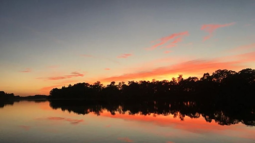 A sunset over the river. 