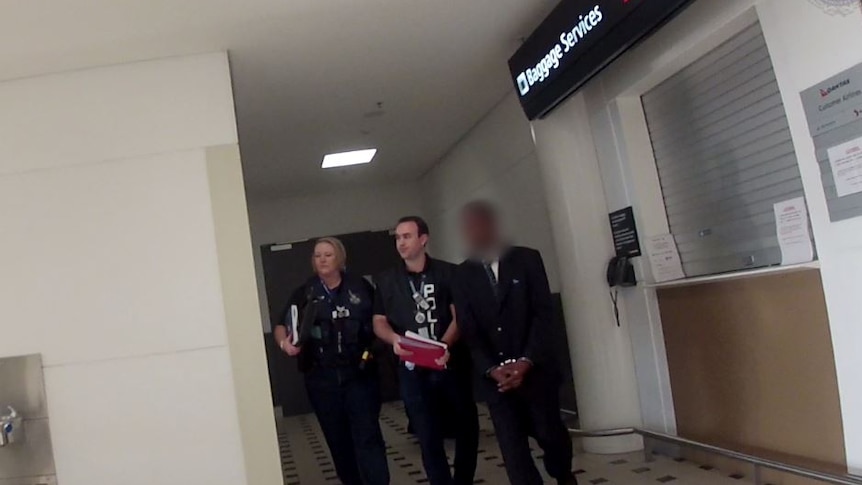 The 37-year-old man was arrested at the Brisbane International Airport.
