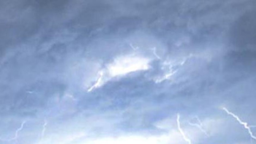 Multiple lightning strikes as the storm passed over Moorooka on Brisbane's southside yesterday.