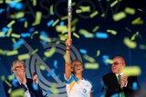 Allison Curbishley holds the Queen's Baton as it arrives in Glasgow