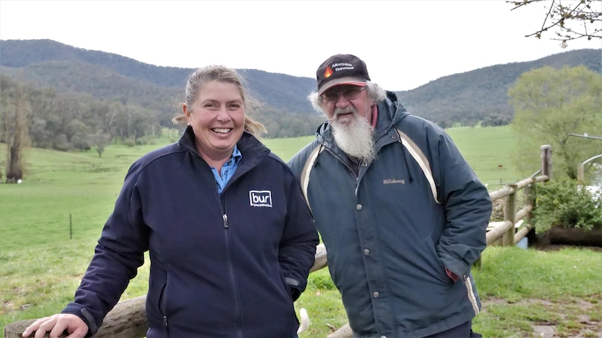 A woman and a man on a farm.