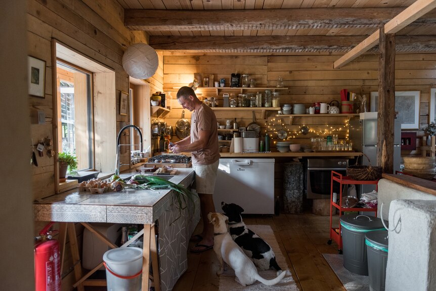 Aljaž prepares a meal for the family with self-produced ingredients in the kitchen