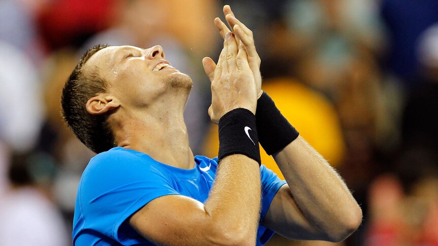 Czech Tomas Berdych celebrates after beating Switzerland's Roger Federer at the US Open.