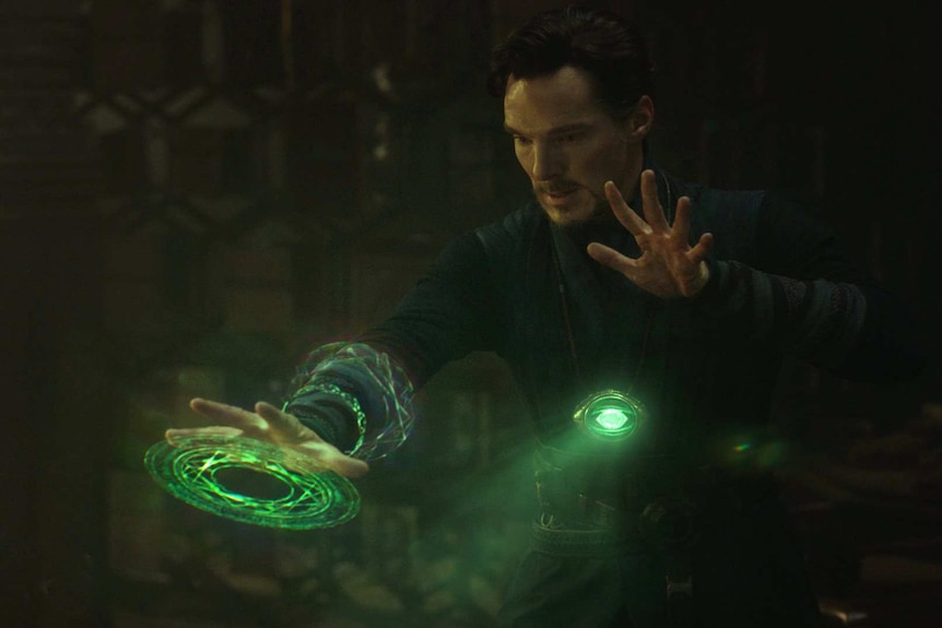 Doctor Strange moves time with the green time stone.
