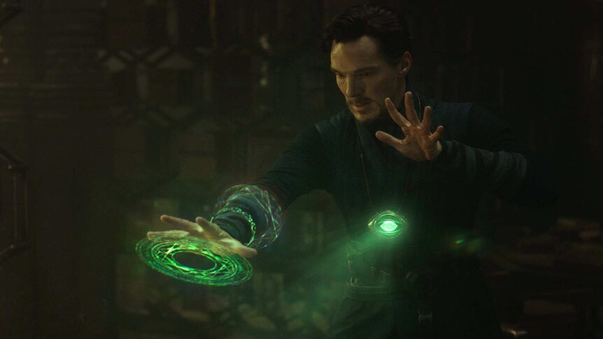 Doctor Strange moves time with the green time stone.