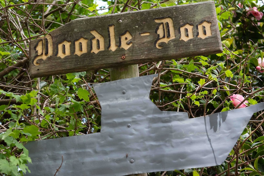 Picture of a sign that says 'Doodle-Doo'