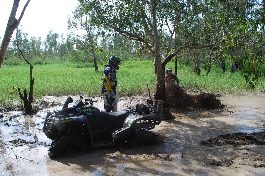 Bikes and quads battle the mud at Kamfari