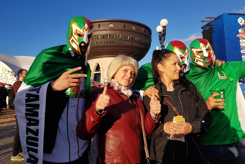 International soccer fans dressed up in elaborate costumes