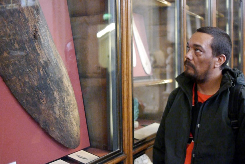 Rodney Kelly viewing his ancestors shield at the British Museum