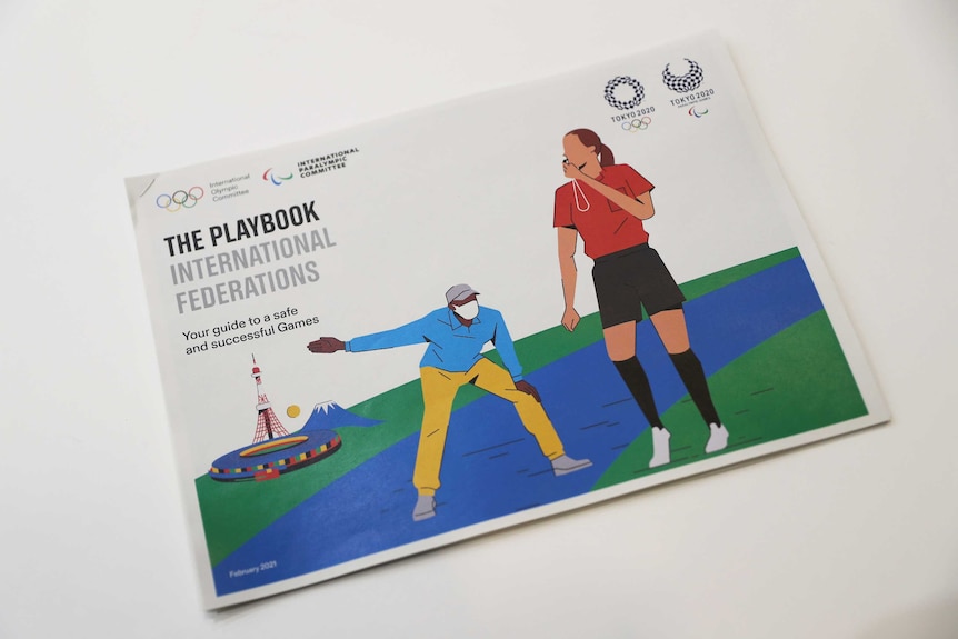 A photo of a pamphlet about the 2021 Olympics and Paralympic Games in Tokyo.