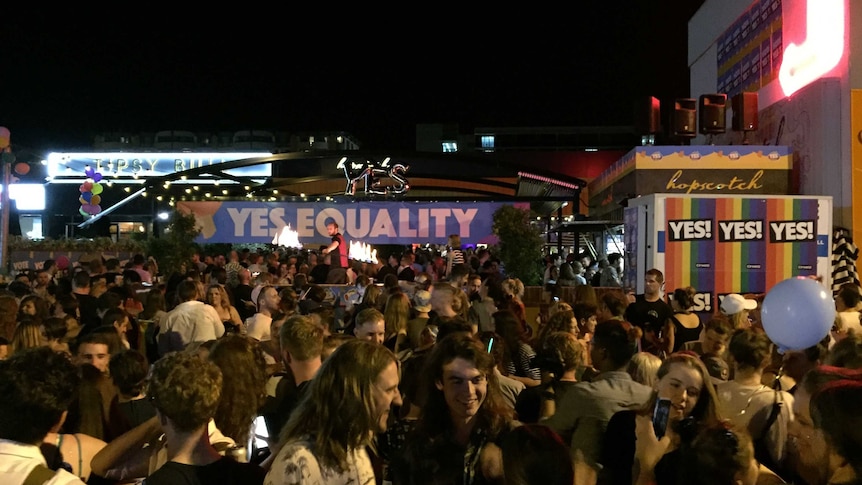 Crowds fill Lonsdale Street in Canberra to celebrate the Yes in the same-sex marriage survey