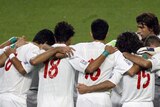 The players wore green wristbands, thought to be a symbol of their support for Mir Hossein Mousavi.