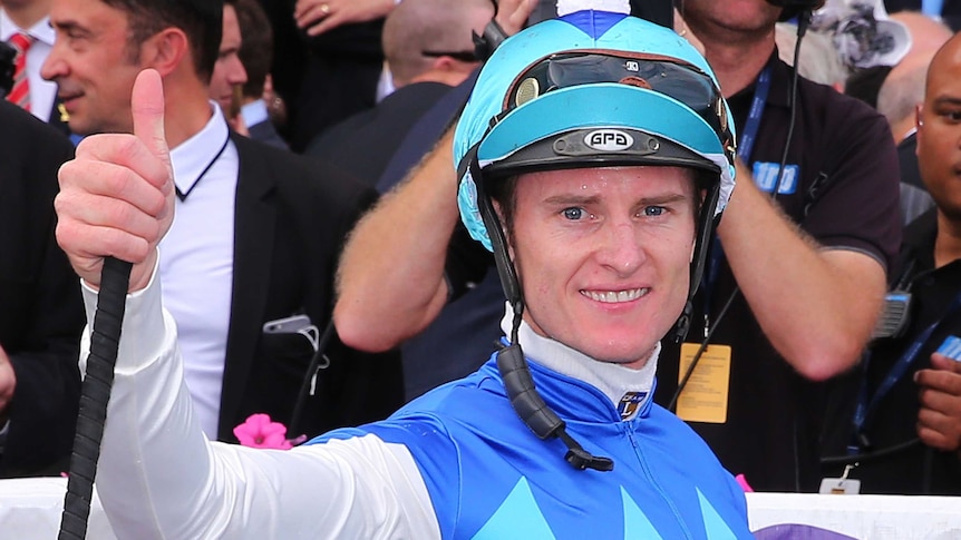 Zac Purton all smiles after Caulfield Cup win