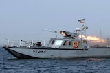 An Iranian war-boat fires a missile during navy exercises