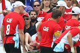 The Swans' Gary Rohan is carried off with a suspected broken ankle in Sydney's win over North Melbourne
