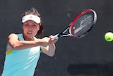 Chinese tennis star Peng Shuai hits a tennis ball during practice at the Australian Open in 2019.