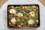 Vegetarian fried rice that's baked on a tray with eggs, peas, beans, sugar snap peas, leek and asparagus, an easy family dinner.