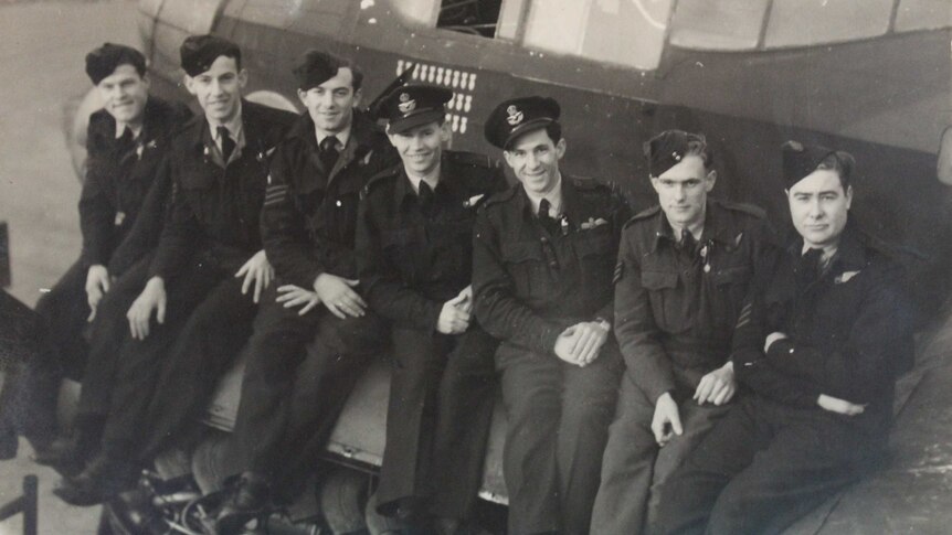 Eric Maxton (far left), Jack Pruss (third from left) and Murray Maxton (third from right) outside a Lancaster Bomber in 1944