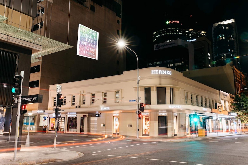 A mock-up of an artwork projected onto a building in the Brisbane CBD