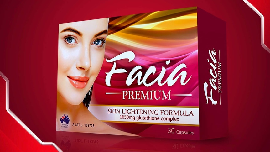 An advertisement posted on Facebook shows a woman smiling on a package of skin lightening formula.