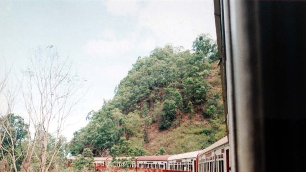A train travels down the Kuranda Scenic Railway