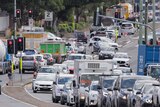 Cars stalled in morning peak hour traffic in Annerley, Brisbane