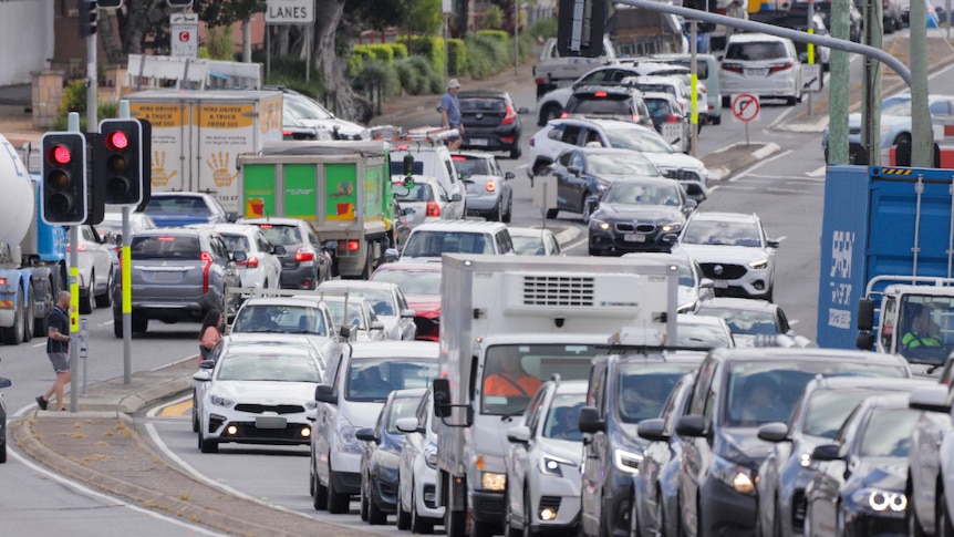 Cars stalled in morning peak hour traffic in Annerley, Brisbane