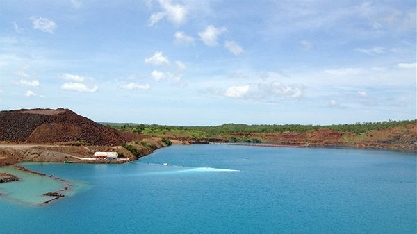 Miner pumps contaminated water into river