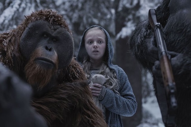 A still image of Maurice the CGI orangutan and actress Amiah Miller.