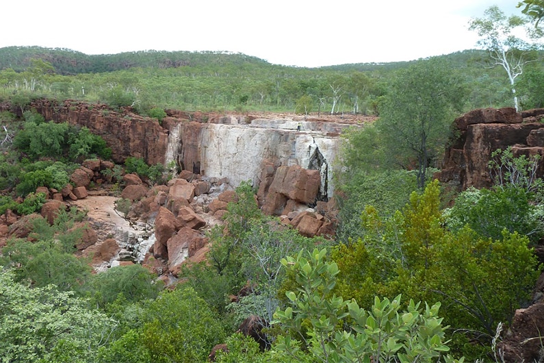 a cliff face that has been stained white.