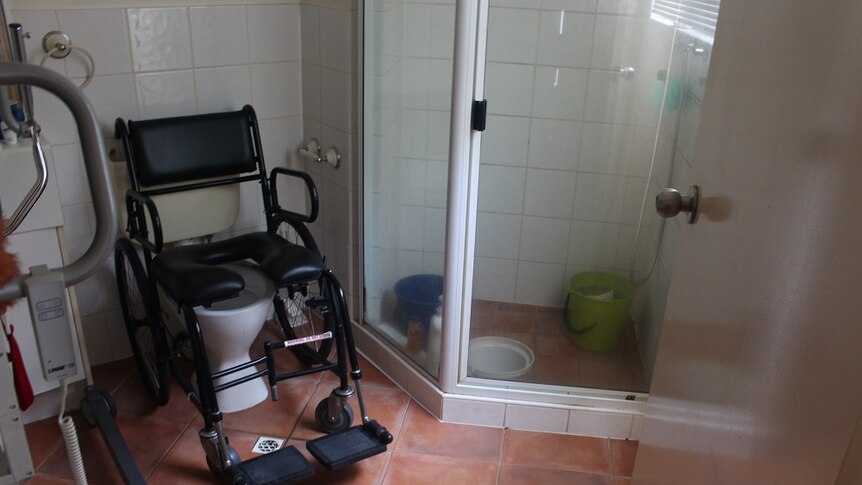 A small bathroom with no modifications made to accommodate Mark Moodie