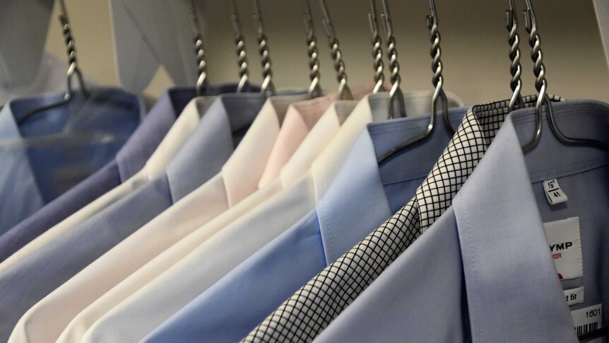 A rack of men's work shirts.