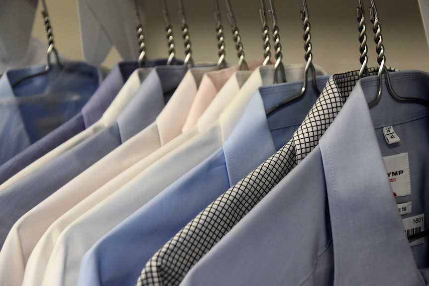 A rack of men's work shirts.