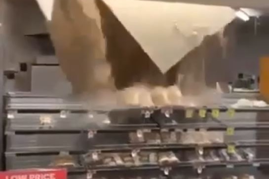 Water comes through the ceiling of a supermarket