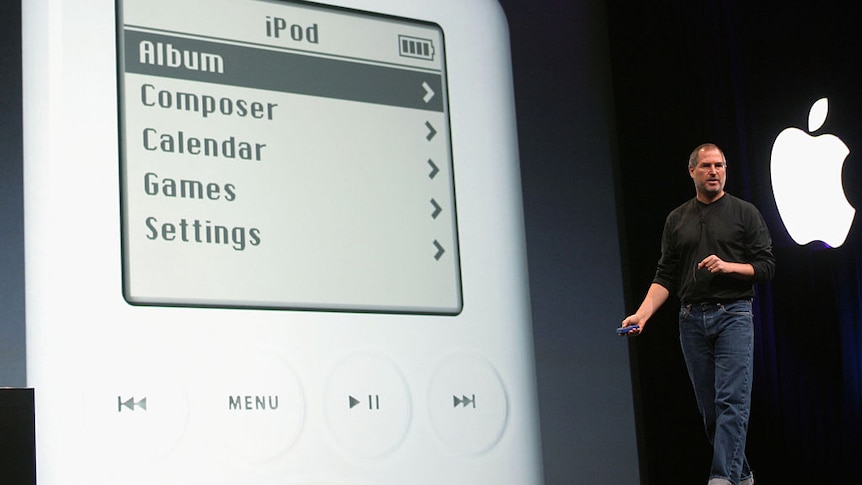 Zoom in of screen of an ipod at launch with Apple CEO Steve Jobs