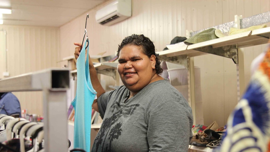 A woman shopping for clothing