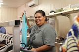 A woman shopping for clothing