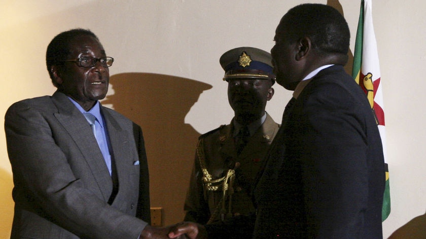 Mr Mugabe (l) and Mr Tsvangirai signed a framework deal committing their parties to talks in July 2008.