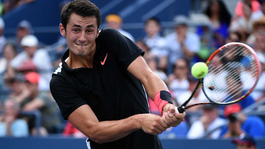 Bernard Tomic on his way to beating Lleyton Hewitt at the US Open