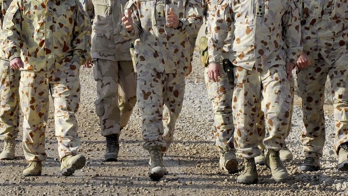 Australian troops walk in Afghanistan (Australian Defence Force)