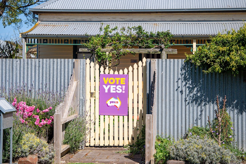 A house with a vote yes sign
