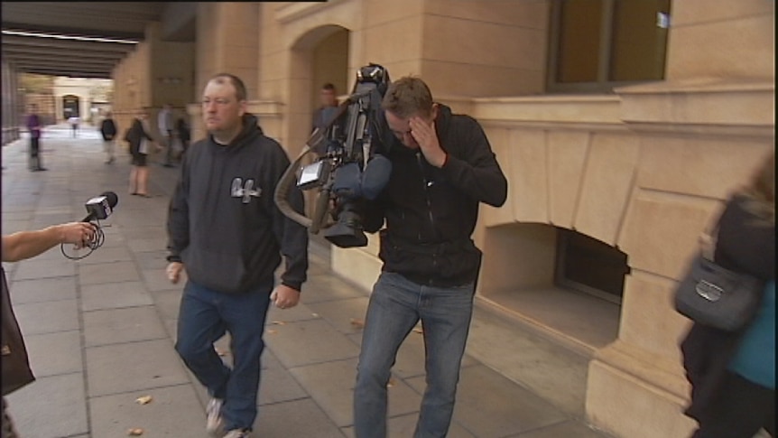 TV cameraman recovers after being punched in the face outside Adelaide courts