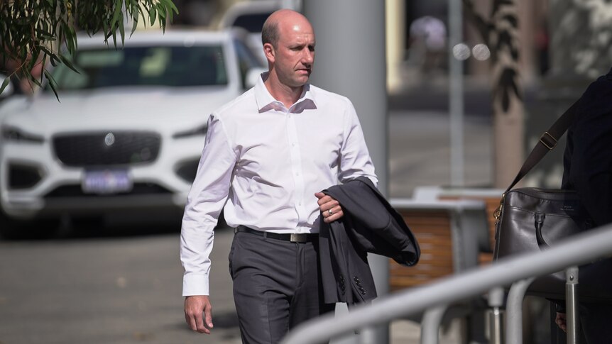Perth Karate instructor Gavin Smith enters Perth District Court.