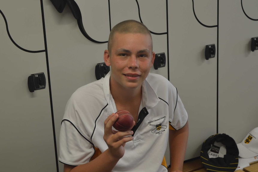 Cooper Rice-Brading holds a cricket ball after a match