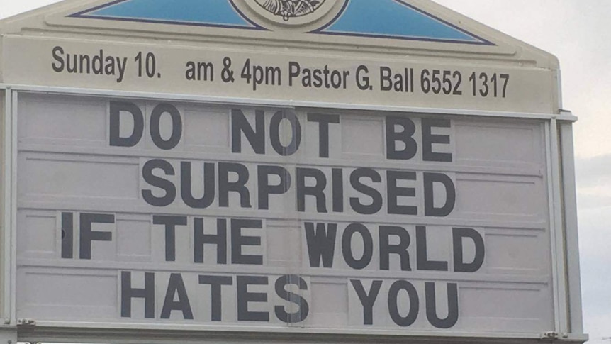 A sign outside a Taree church which says, "Do not be surprised if the world hates you"